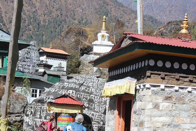 Everest Three Pass Trek - Tengboche to Dingboche: prayer wheels, rhododendron, and big-wall views