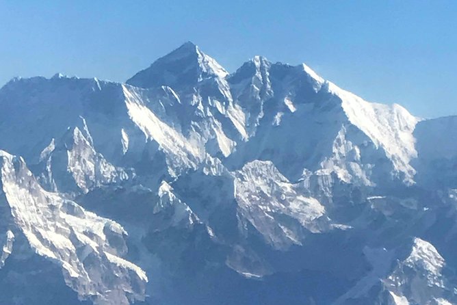 Mountain Flight in Nepal - Practical considerations: weather, insurance, and early mornings